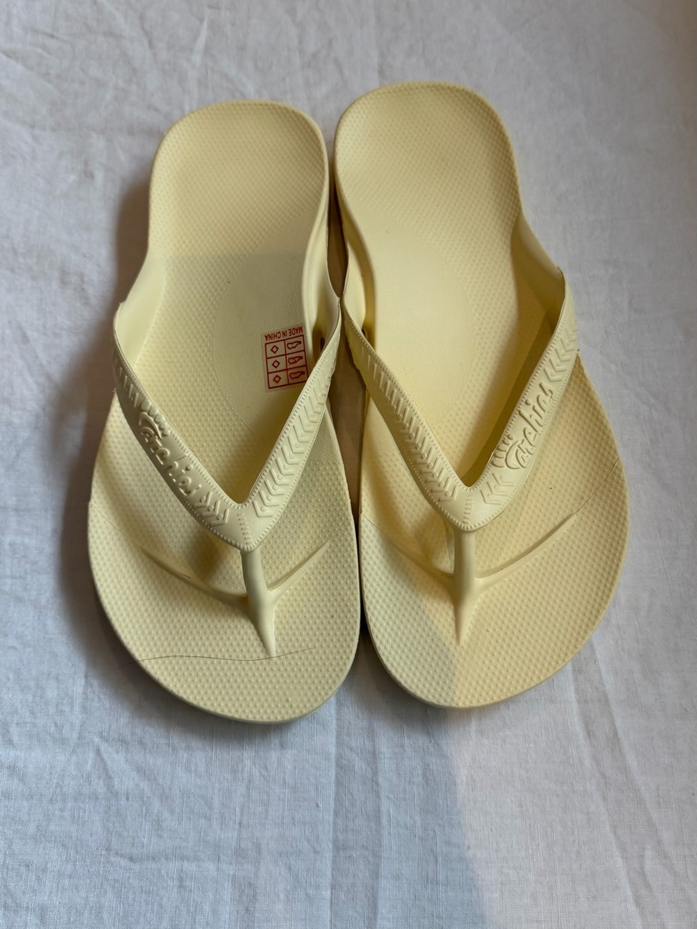 Archie's Women’s Flip Flops in Pale Yellow